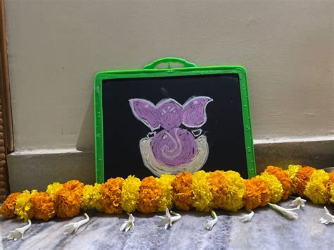 A Chalkboard With A Drawing Of A Pig On It Next To Flowers And Leaves