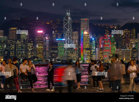 The Famous Tsim Sha Tsui Promenade And Tourists Enjoying The Evening