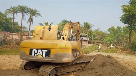 Cat 312c Excavator দিয়ে পুকুরের পাড় ভেঙ্গে পুকুর ভরাট করা হচ্ছে Youtube