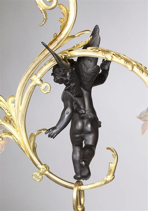 A Fine Whimsical French Belle Poque Gilt And Ebonized Bronze Cherub