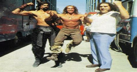 Wilt Chamberlain and Andre the Giant -- holding up Arnold Schwarzenegger (on the set of Conan ...