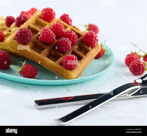 Stack Of Baked Belgian Waffles With Ripe Red Raspberry Stock Photo Alamy