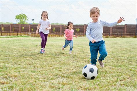 Kids Playing Football Stock Photos Motion Array