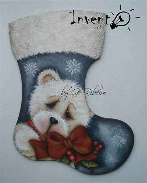 A Christmas Stocking With A Teddy Bear On It