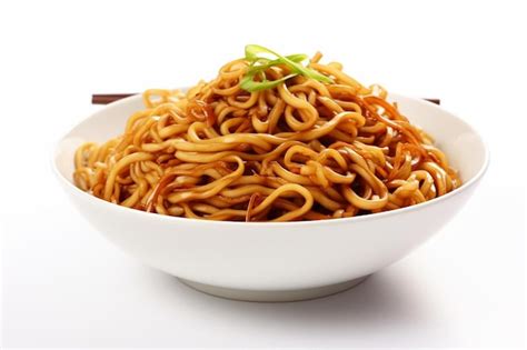 Premium Photo A White Bowl Filled With Noodles And Chopsticks