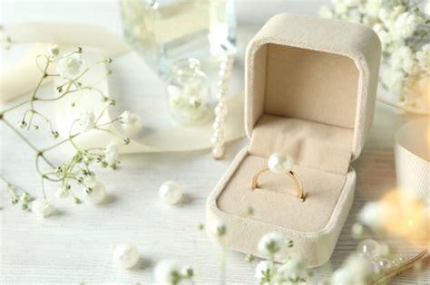 Premium Photo Concept Of Wedding Accessories With Wedding Ring Close Up