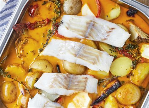 Baked Alaska pollock with root vegetables in red curry and coconut ...