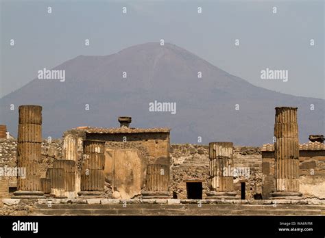 A landscape view of Mount Vesuvius, behind the ancient ruins of Pompeii ...