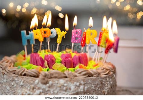 Happy Birthday Candles Lit On Cake Stock Photo Shutterstock