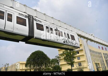 An Elevated New Energy Monorail Train Travels Along A Km Track