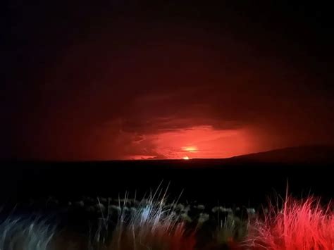 Red skies, red-hot lava: World's largest active volcano erupts in ...