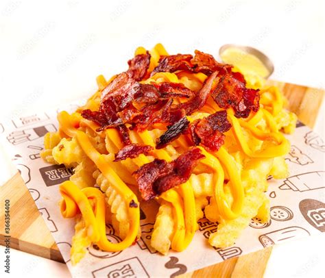 Foto De Batata Frita Cheddar E Bacon Do Stock Adobe Stock