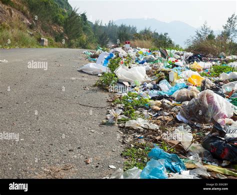 Spontaneous garbage dump along the road in Vietnam Stock Photo - Alamy