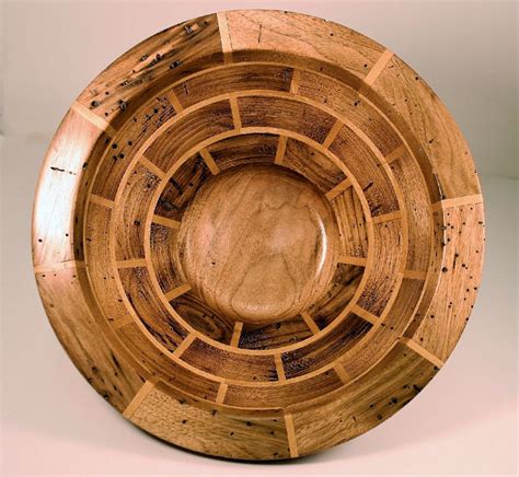 This Segmented Hand Crafted Wooden Bowl Is Made Of Wormy Butter Nut