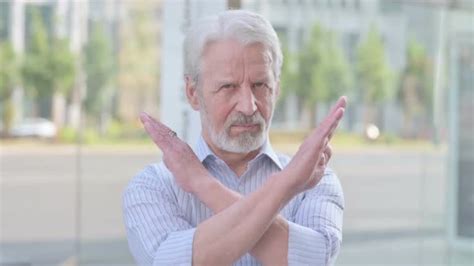 Portrait Of Rejecting Old Man Doing No Gesture Outdoor Stock Footage