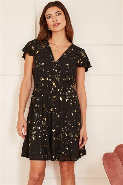 Mela Black Foil Star Print Wrap Skater Dress Mela