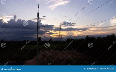 Silhouette Of Electric Pole At Dusk. Electric Poles And Wires In The ...