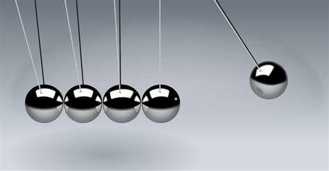 Gray Newtons Cradle In Close Up Photogaphy · Free Stock Photo