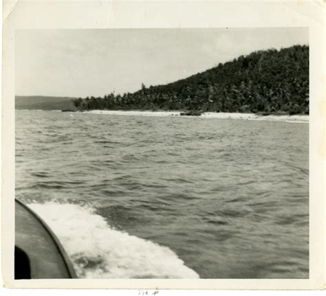 Island shore line seen from Navy motorboat. Homonhon Island, Eastern ...