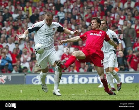 Liverpools Xabi Alonso Challenges West Ham Uniteds Dean Ashton Hi Res