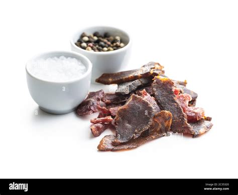 Beef Jerky Pieces With Salt And Pepper Dried Beef Meat Isolated On