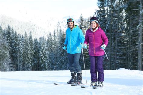 Happy Couple With Ski Equipment Spending Winter Vacation Stock Image