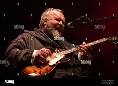 John Martyn playing at a music festival Stock Photo - Alamy