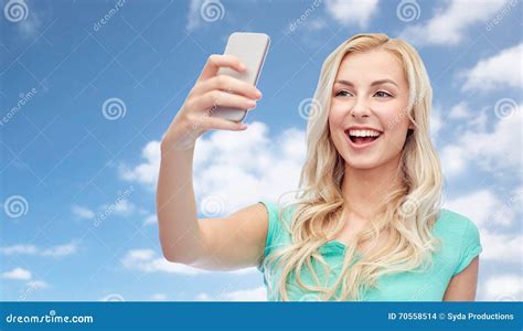 Smiling Young Woman Taking Selfie With Smartphone Stock Photo Image