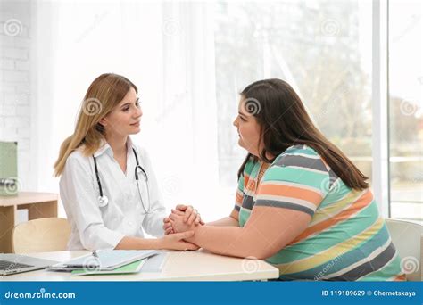 Female Doctor Consulting Overweight Woman Stock Image Image Of