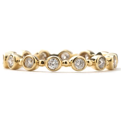 Bezel Set Diamond 036 Cttw Eternity Band In Yellow Gold New York