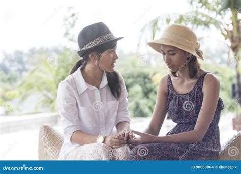 Portrait Of Asian Younger Woman Friend Serious Talking Stock Photo