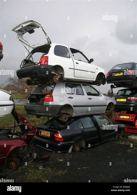 Cars Stacked Up In A Scrap Yard Stock Photo Alamy