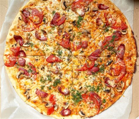 Premium Photo Baked Round Pizza With Smoked Sausages Mushrooms