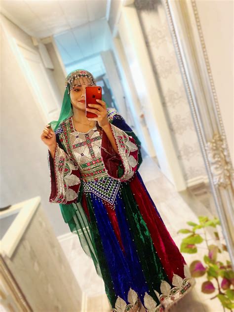 'This is how we dress': Afghan women overseas pose in colourful attire