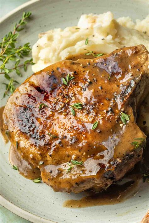 Easy Smothered Pork Chops With Gravy Simply Whisked