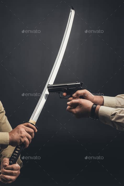 yakuza members fighting with gun and katana sword on black Stock Photo ...