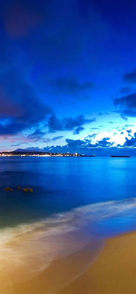 Blue light over the ocean water - HD wallpaper