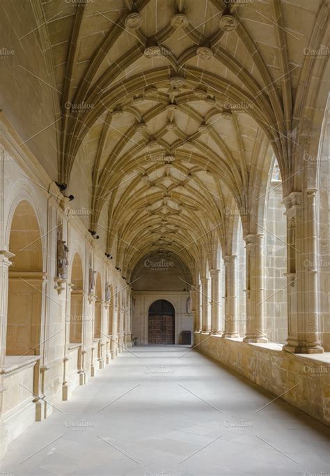 Medieval cloister in monastery ~ Architecture Photos ~ Creative Market