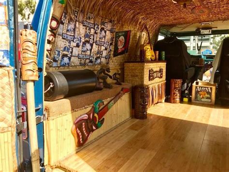 The Inside Of A Van With Various Items On Display