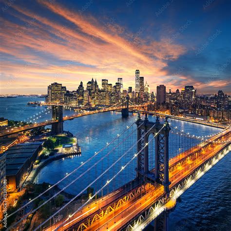 New York City Sunset Over Manhattan And Brooklyn Bridge Stock Photo