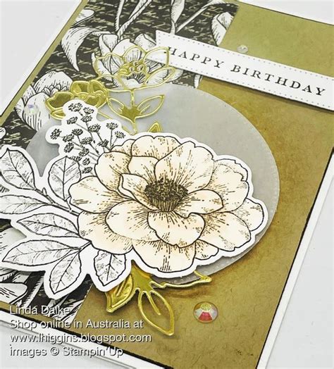 A Close Up Of A Birthday Card With Flowers On The Front And Back Of It