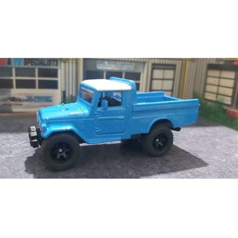 HOT WHEELS TOYOTA LAND CRUISER NOVO SEM EMBALAGEM RODAS ESPECIAIS PNEUS DE BORRACHA ESCALA 1