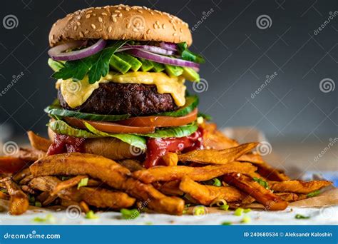 Homemade Plant Based Burger With Sweet Potato Fries Around Vegan