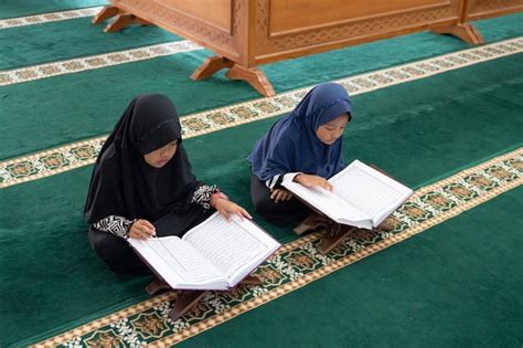 Premium Photo Two Kids Read Holy Quran