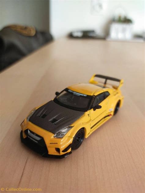 Nissan Skyline Gt R R Lbwk Modelos A Escala Coches Color Amarillo