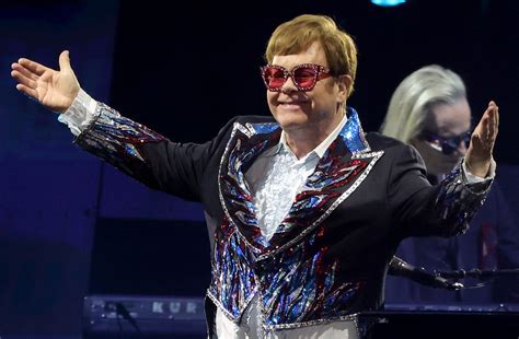 Bruce Jenner Shines At Elton John Concert With Date