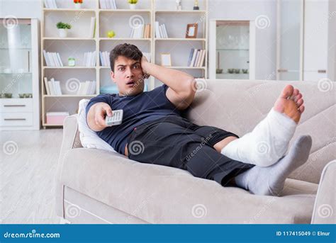 The Man With Broken Leg Recovering At Home Stock Image Image Of