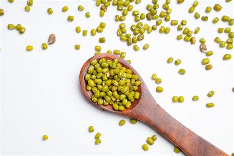 Premium Photo Green Gram Or Mung Bean In Wooden Spoon Over White