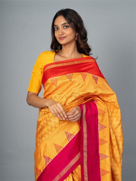 Mustard Yellow Ikat Silk Saree With Black And Red Border Handwoven