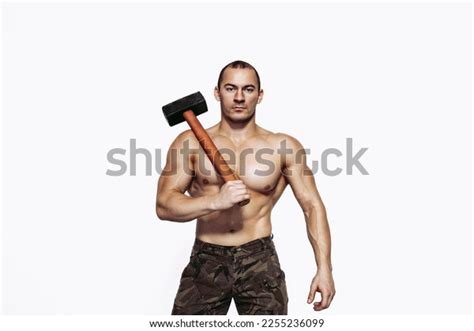 Strong Man Naked Torso Holds Sledgehammer Stock Photo